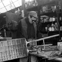 Elements for <em>Albany I</em> (1959) and other sculptures laid out for assembly on the floor of David Smith's workshop in Bolton Landing, NY, c. 1959